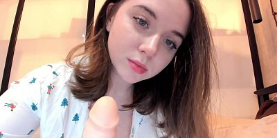 A slender girl shows her naked body and caresses a pussy