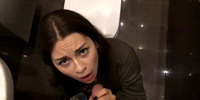 A stranger without complexes sucks a man's cock near the toi