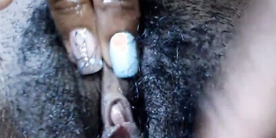 Amateur ebony gal is displaying her big natural curves while masturbating