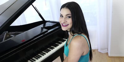 Beautiful brunette plays the piano and the dick afterwards
