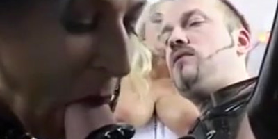 Blond and dark hair in a BDSM threesome orgy