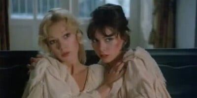 Brigitte Lahaie performs a classic lesbian scene in cozy bed