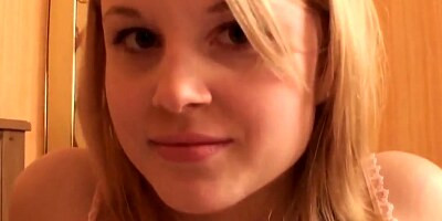 Cute blonde college girl strips and spread her pink pussy lips