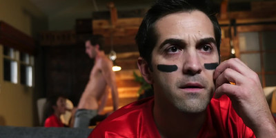 Hottie in a football T-shirt opens holes in front of a stud