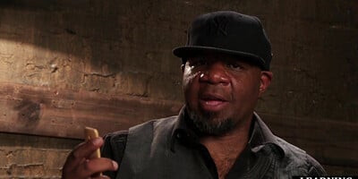 Instructor explaining BDSM with toys on a hot latina babe