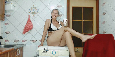 Lukerya walks by the river