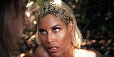 Racy blonde milf with big boobs is making love with a fresh teen, in the nature