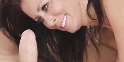 Sensational busty MILF in black stockings lets the young hunk eat her out before sex