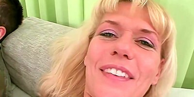 Slutty blonde mature was wearing only black stockings while she was getting fucked in the ass