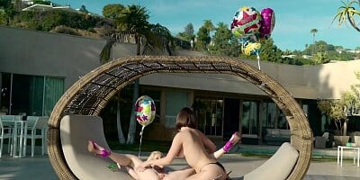 Two beautiful babes enjoy lesbian sex in the sun