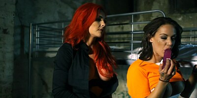 Two girls in a prison cell fuck one another like crazy