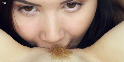 Two sex-hungry cuties please each other in a 69 position