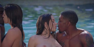 Two shameless white girls sucking off two black guys in the pool
