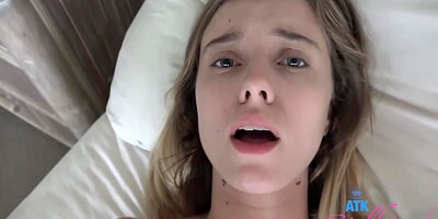 Young babe is giving a perfect footjob to her handsome client, in front of the camera